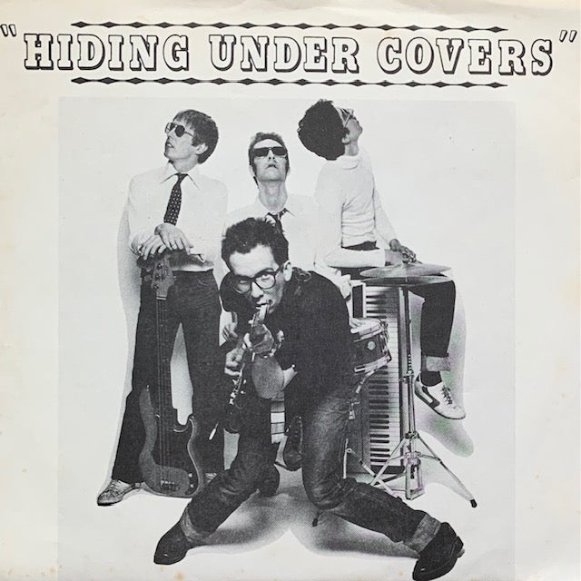 Elvis Costello & The Attractions - Hiding Under Covers